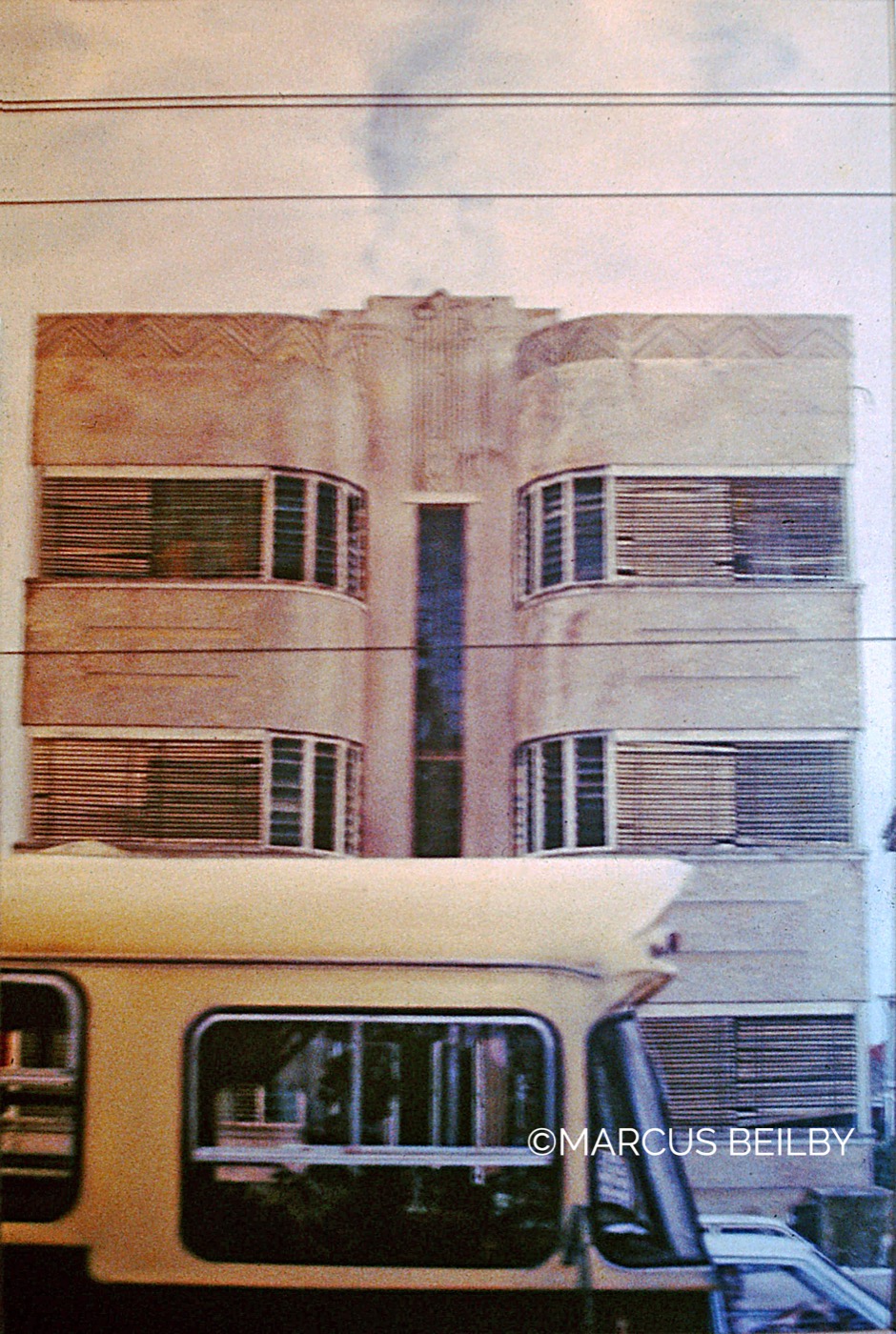 Death watch bus 1976, an urban painting by Australian realist Marcus Beilby